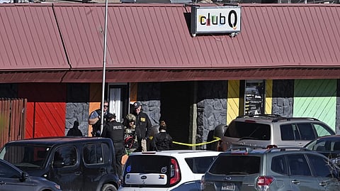 Colorado Springs police, the FBI and others investigate the scene of a shooting at Club Q on Sunday, Nov. 20, 2022 in Colorado Springs.