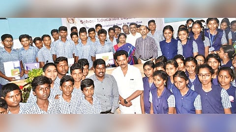 Minister Poyyamozhi and Tiruchy Collector M Pradeep Kumar along with the students on Wednesday.