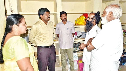 Tiruchy Collector M Pradeep Kumar interacting with Murugan and Santhan at special camp prison on Monday