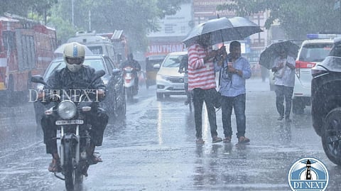 People travelling in the middle of heavy rains