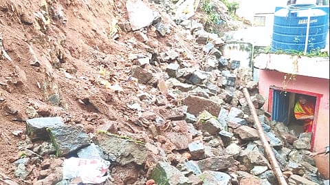 The family trapped inside their house due to a wall collapse in Coonoor on Thursday