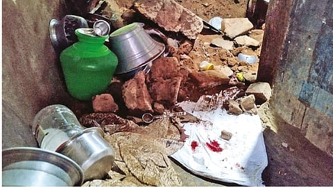 A portion of wall that collapsed when the family was fast asleep