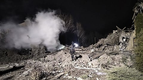Ukrainian firefighters work at damaged hospital maternity ward in Vilniansk, Zaporizhzhia region, Ukraine