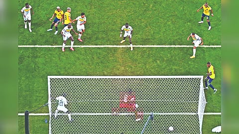 enegal?s Kalidou Koulibaly scores his team?s second goal against Ecuador