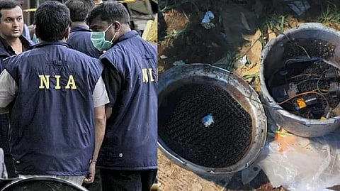 A cooker fitted with detonator, wires and batteries found during the investigation after an explosion in an auto-rickshaw in Mangalore (R)