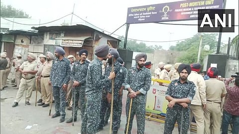 Security force deployed outside the post mortem unit in Punjab's Amritsar