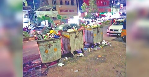 The three dustbins placed almost on the mid of the Gandhi Irwin Road near Egmore railway station