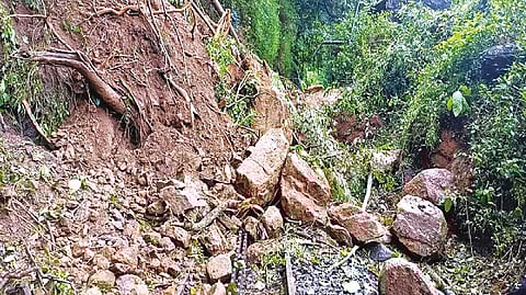 Nilgiri Mountain Railway track blocked by boulders amd mud
