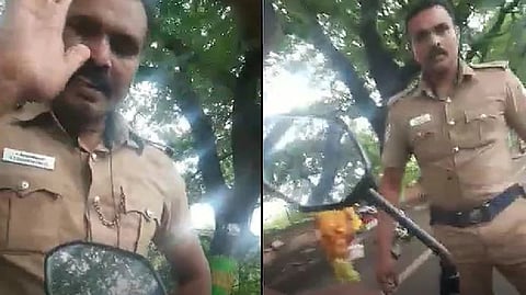 Cop who abused activist over helmet issue booked