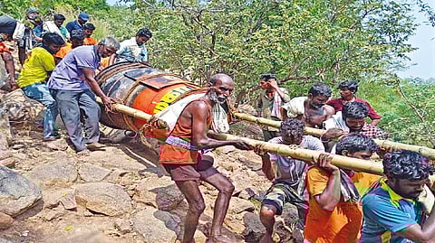 The cauldron being brought down the Annamali hill