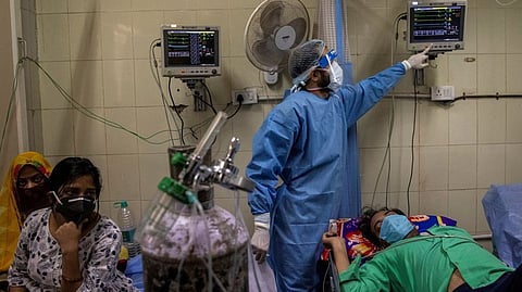 Patients suffering from the coronavirus disease get treatment at the casualty ward in Lok Nayak Jai Prakash (LNJP) hospital, amidst the spread of the disease in New Delhi.