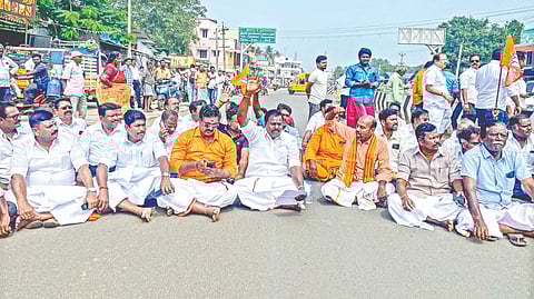 BJP cadre sitting in protest to allow them to garland Dr Ambedkar?s statue in Thanjavur.