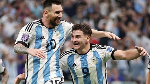 Argentina's Messi and Alvarez celebrate after scoring a second goal against Croatia
