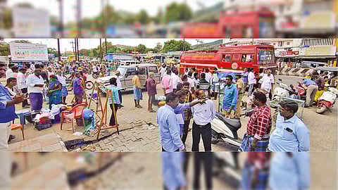 Shopkeepers arguing with police personnel and officials in front of GH to stop eviction in Chengalpattu on Friday