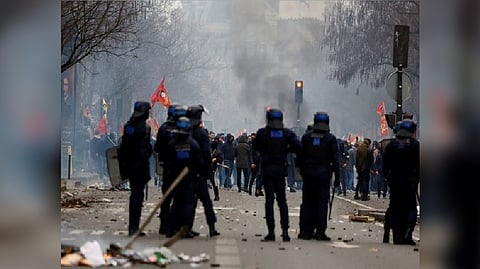 Members of the Kurdish community gather at the Place de la Republique square following the shooting, in Paris.