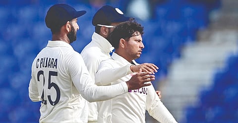 Kuldeep Yadav (right)
won the ?Man of the Match? award for his eight wicket haul