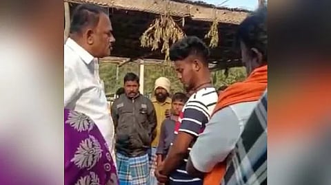 Screengrab from the video of T Manickam verbally abusing a Dalit youth.