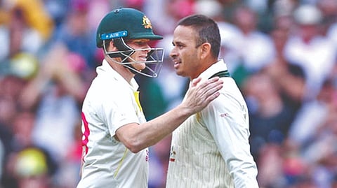 Usman Khawaja (right) and Steve Smith took the match away from South Africa on the second day
