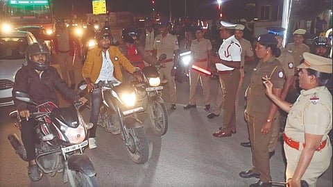 Police asking vehicle users to follow traffic rules in Coimbatore on New Year eve