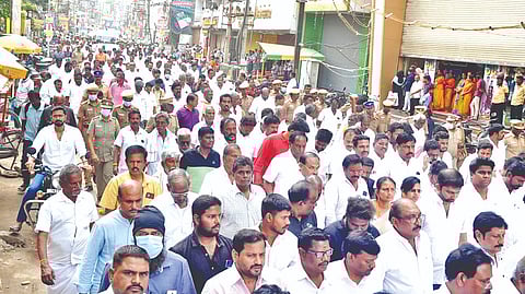 A large number of people participating in the funeral of E Thirumahan Everaa in Erode on Thursday