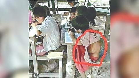 An image of children studying