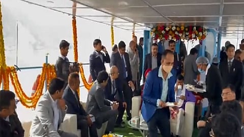 Union Minister Hardeep Singh Puri riding inland water vessel in Brahmaputra river
