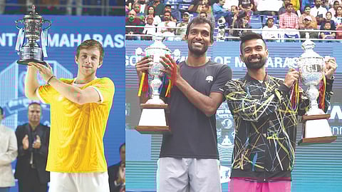 (L) Tallon Griekspoor holds the winner?s trophy 
(R) India?s N Sriram Balaji and Jeevan Nedunchezhiyan
with the runners up trophy in doubles