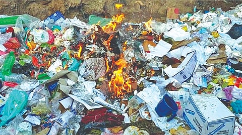 A pile of medical waste set on fire near Kancheepuram Government Hospital