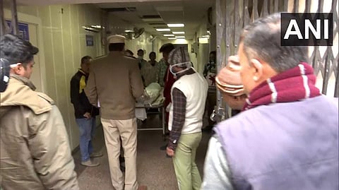 Mortal remains of the deceased woman were taken to her residence from the hospital in an ambulance