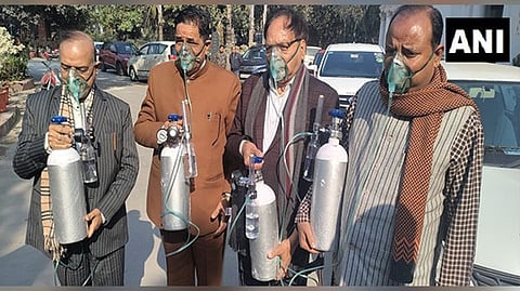BJP leaders arrive with Oxygen Cylinders and masks