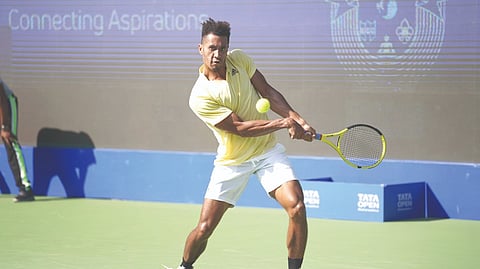 Michael Mmoh in action during first-round on Monday