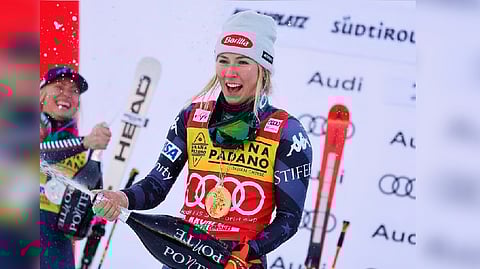 Mikaela Shiffrin of the U.S. celebrates on the podium after winning