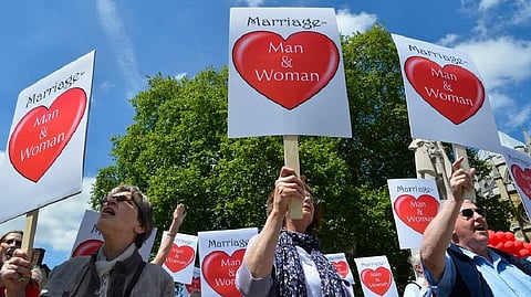 Demonstrators protesting against Gay marriage bill