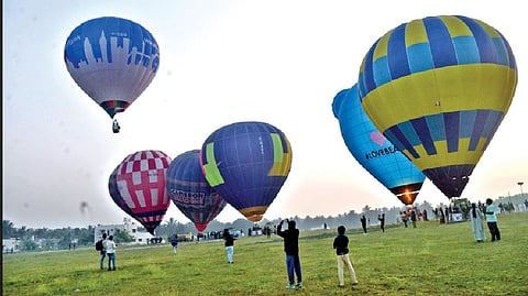 Hot-air balloons taking to skies in Pollachi on Friday.