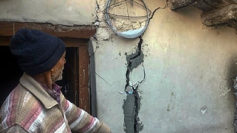 Joshimath is sinking gradually with huge cracks developing in houses, roads and fields