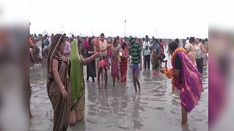 Devotees gather for the holy dip in the Ganges at Gangsagar.