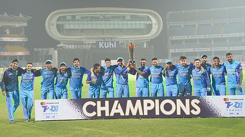 India players pose with the trophy after beating Sri Lanka in the deciding T20I in Rajkot