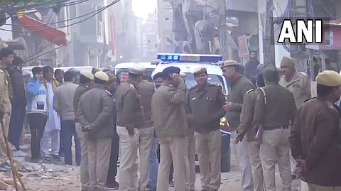 Delhi police at the Sultanpuri area