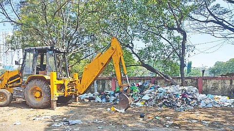 A heap of garbage dumped on a road in SIDCO Industrial Estate in Ekkattuthangal