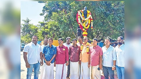 Local dignitaries after garlanding the statue of Narasimha Varman (I) Pallavan on his birth anniversary at Mahabalipuram on Tuesday
