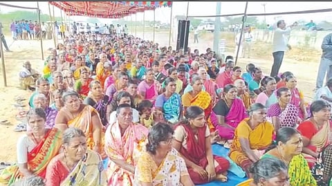 Residents hold a sit-in protest against the Greenfield Airport