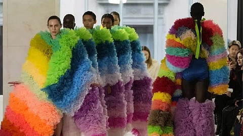 Models wear creations as part of the Tomo Koizumi women's Fall-Winter 2023-24 collection presented in Milan, Italy, Sunday, Feb. 26, 2023.