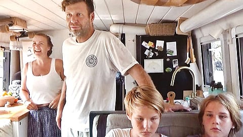 The German couple and their kids in the remodeled recreational vehicle stationed at Mahabalipuram on Wednesday