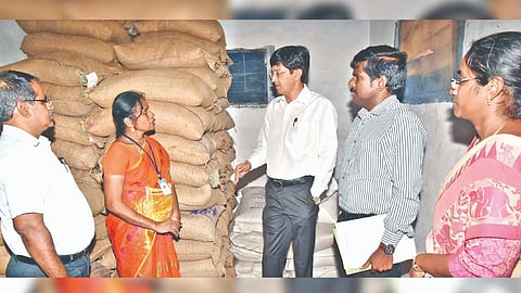 Additional Chief Secretary Dr J Radhakrishnan in a godown at Tiruchy on Saturday
