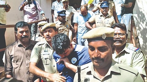 Arrested thieves brought from Haryana being taken to the
court in Tiruvannamalai on Saturday