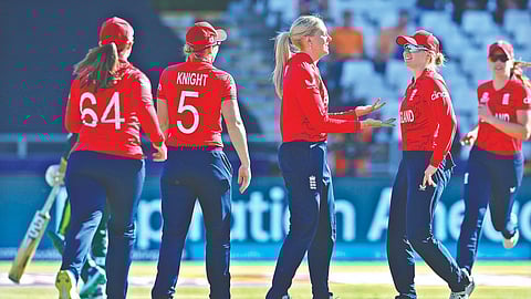 England celebrates the dismissal of Pakistan?s Nida Dar