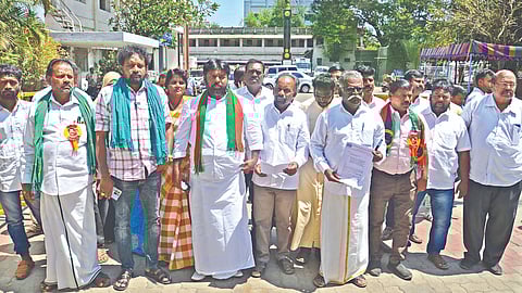 Members of Tamil National Federation after petitioning the Returning Officer in Erode on Thursday