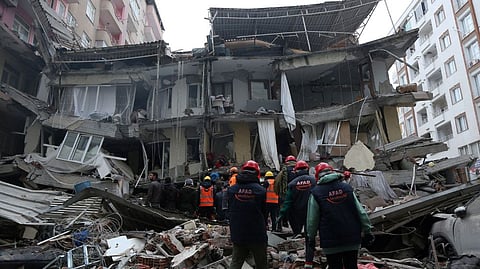 Rescuers search for survivors following an earthquake in Diyarbakir, Turkey