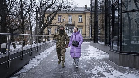 Ukrainian soldier Vitalii Khroniuk and his partner Anna Sokurenko