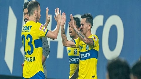 Kerala Blasters FC players celebrating.